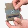 Man pulling an RFID blocker card from the A&K LITE card holder.